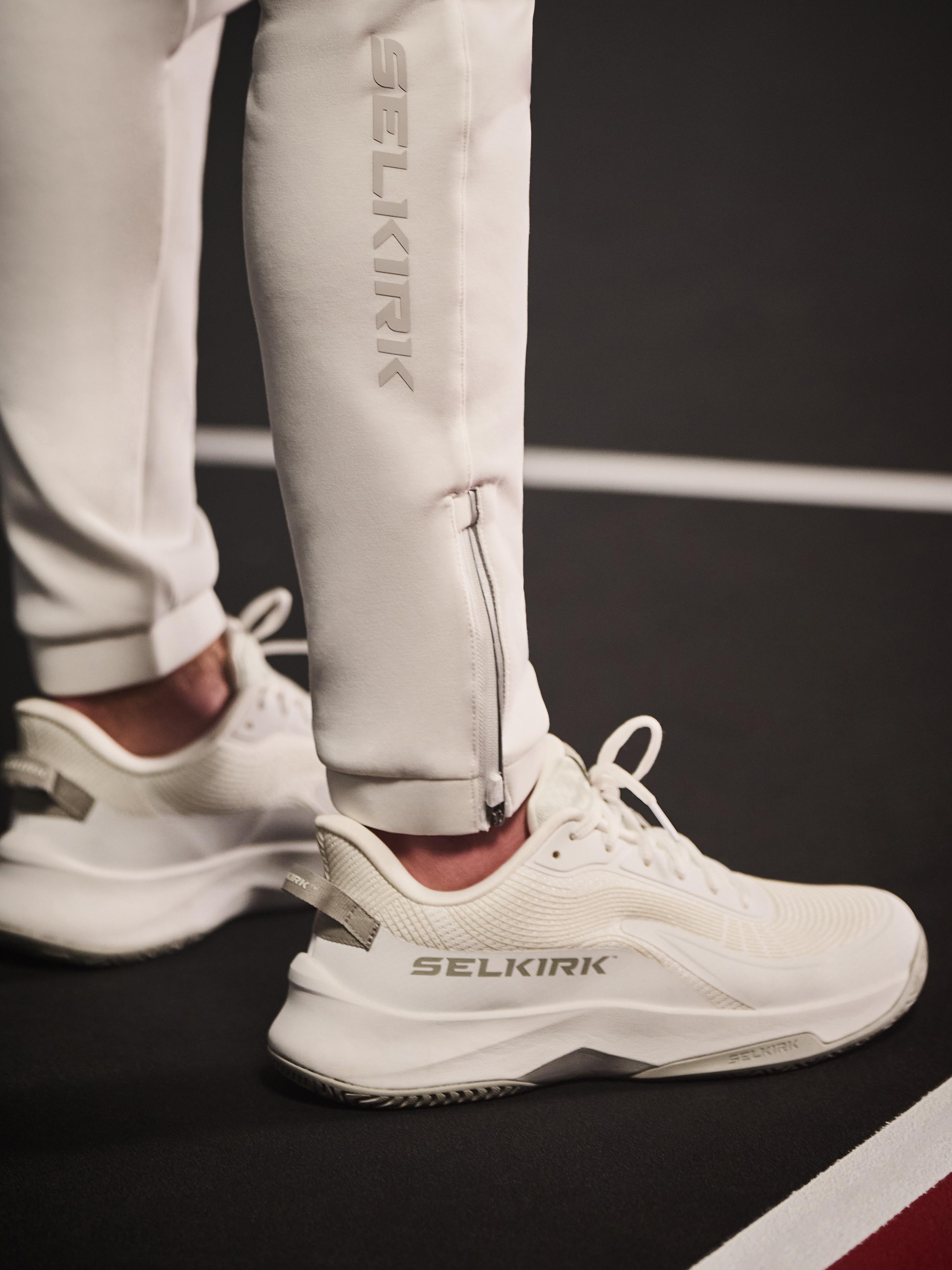 Close-up of Selkirk jogger with zippered ankle and Selkirk shoes
