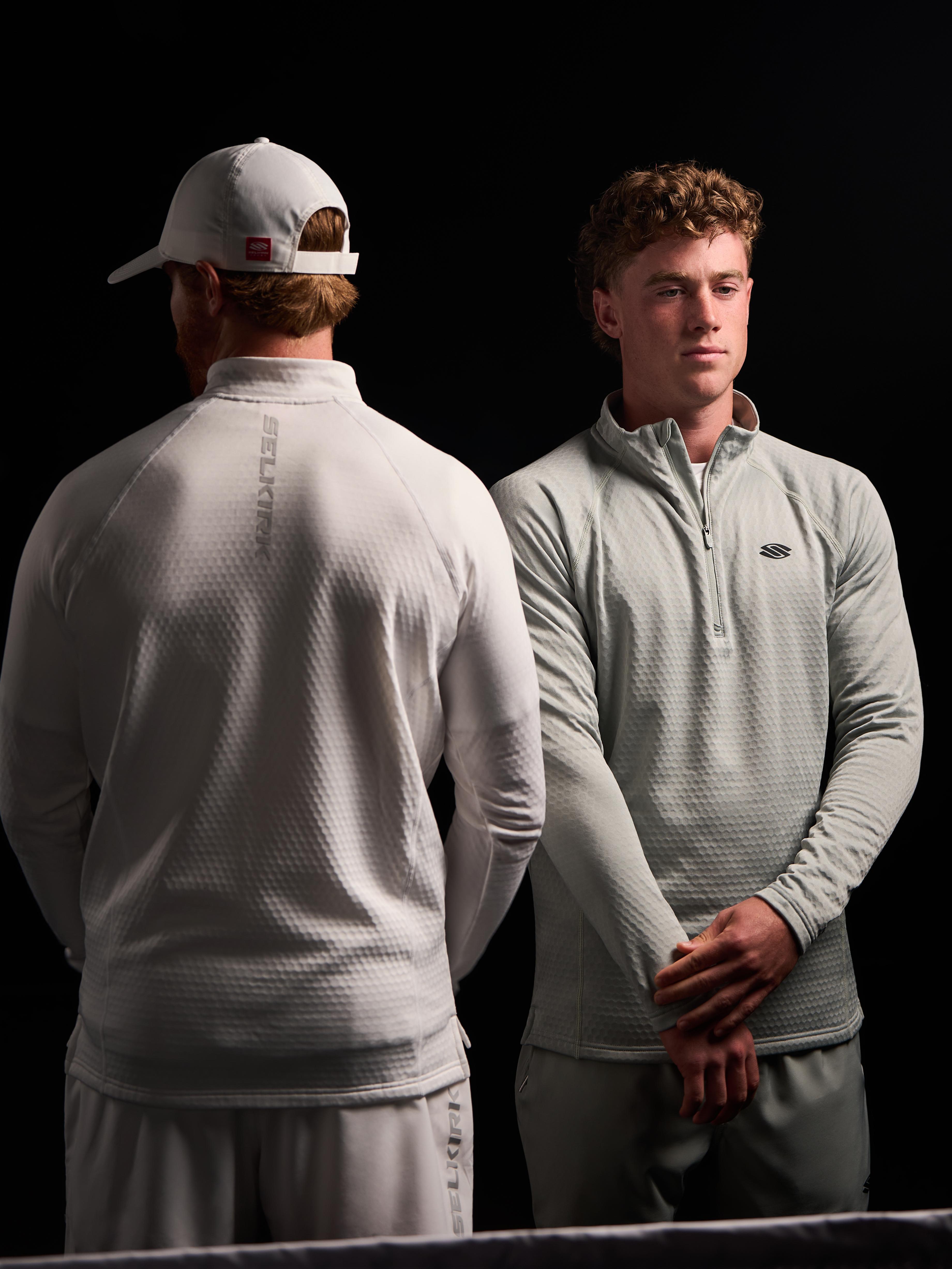 Men's Pro Line 1/4 Zip Pullover in light color, showcasing front and back views.