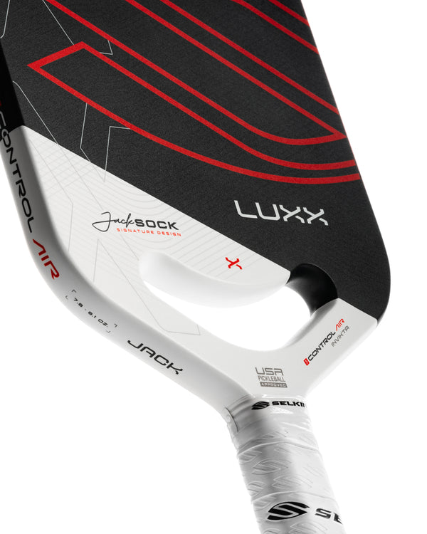 Selkirk LUXX Control Air Invikta paddle with Jack Sock signature, featuring a black and red design.