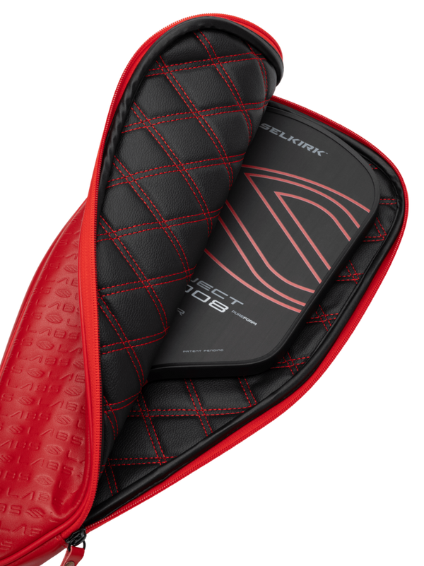 Selkirk LABS Project 008 13mm Tour pickleball paddle in a red protective case.