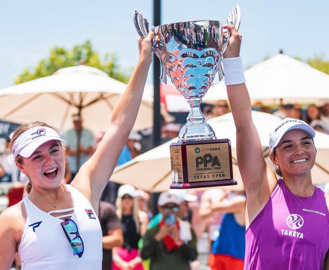 Catherine Parenteau and Anna Leigh Waters celebrating with the championship trophy at the PPA Selkirk Texas Open.