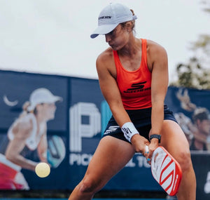 Player preparing to hit a pickleball during a match at the PPA Orange County Cup