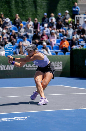 Catherine Parenteau playing pickleball in a tournament setting