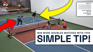 Two pickleball players communicating on the court with arrows indicating movement. Text: 'WIN MORE DOUBLES MATCHES WITH THIS SIMPLE TIP!'