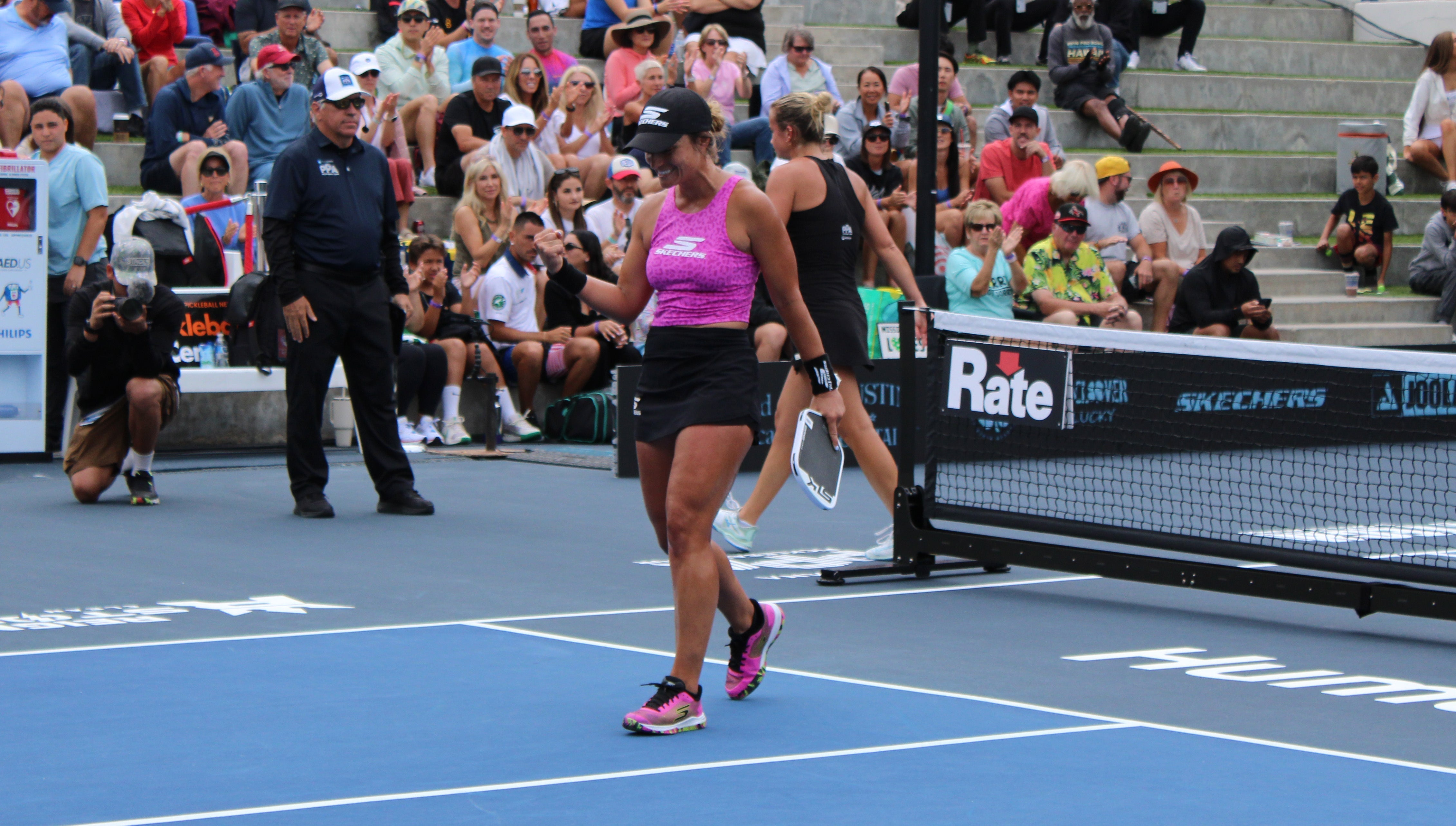 Catherine Parenteau fist pumping after winning her singles quarterfinals match