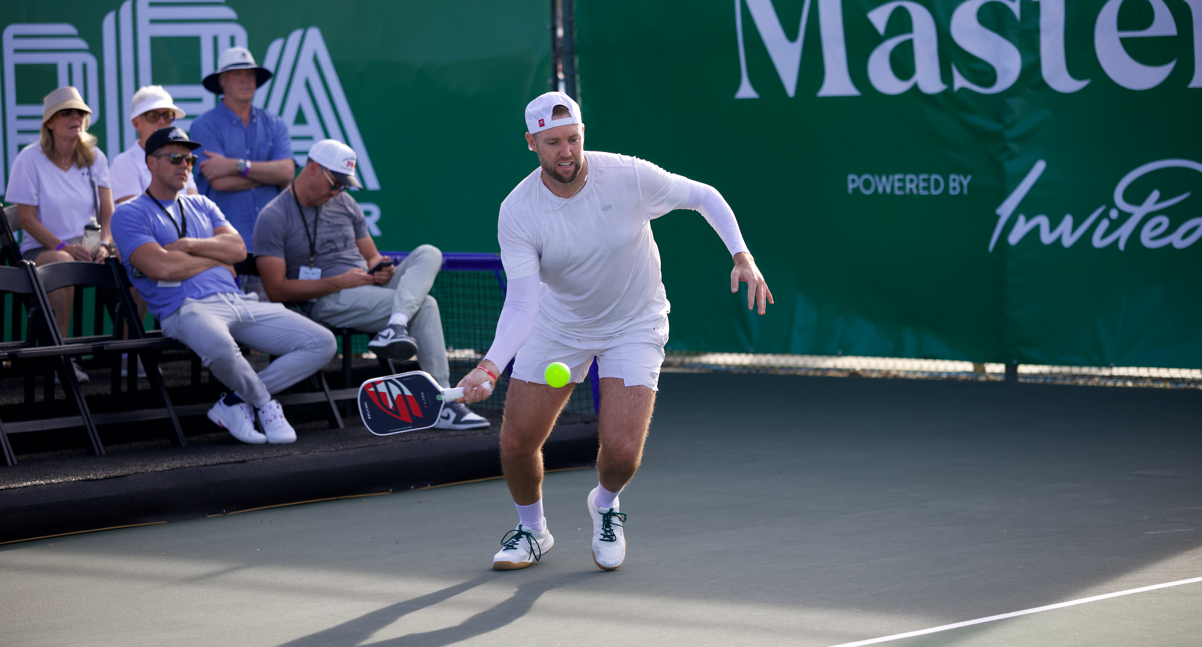 Jack Sock hits a forehand with his signature Boomstik paddle
