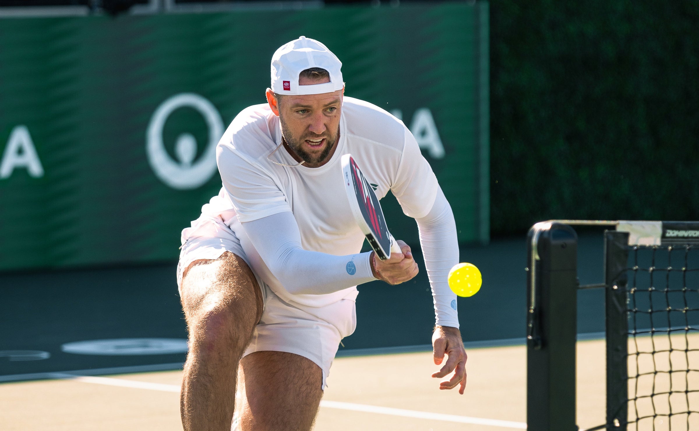 Jack Sock hits a forehand with the Jack Sock Signature Boomstik