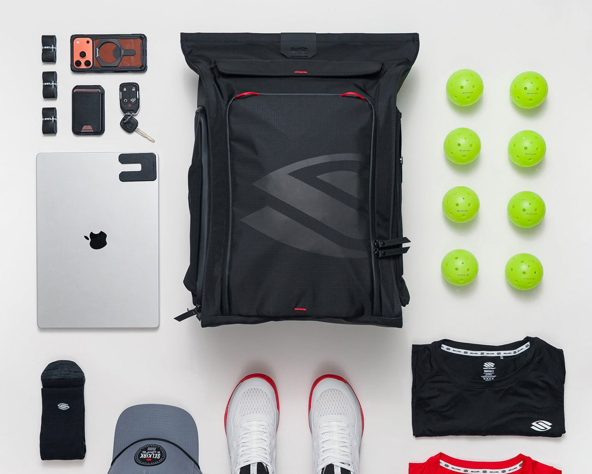 Aerial photo of selkirk 2.0 pro line bag surrounded by pickleball gear