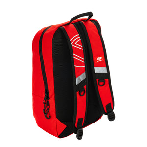 Red backpack viewed from back with padded black mesh shoulder straps, reflective strip and zippered side pocket.