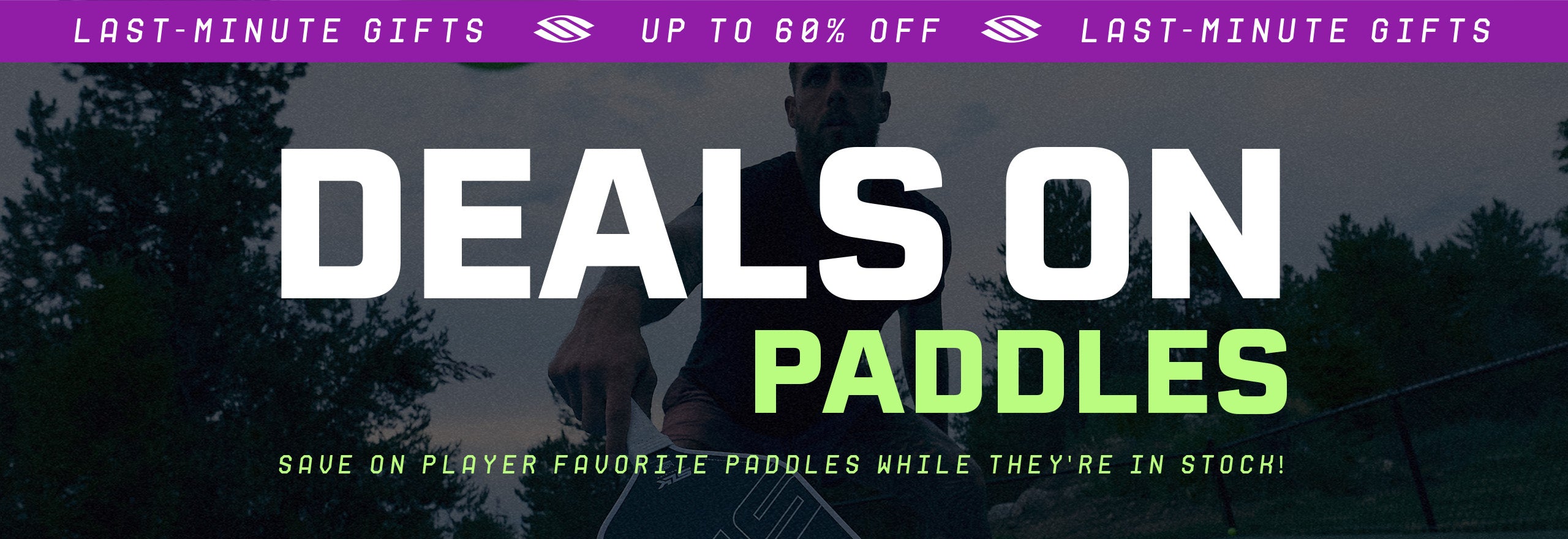 A man playing pickleball