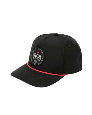 Black cap with circular patch reading SELKIRK Sport Est. 2014 and thin red cord above the brim