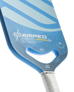 Blue Selkirk paddle labeled AMPED INVIKTA PRO Air MIDWEIGHT; HOLDERNESS; USA; SELKIRK