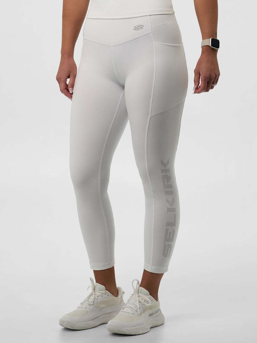 Women's Pro Line Legging in Chalk color, featuring a form-fitting design and logo.