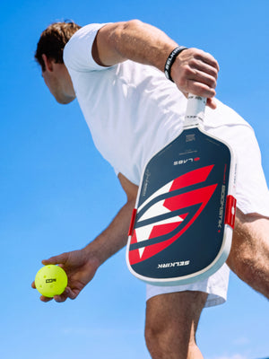 Player serving the S2 Pro Ball with a Selkirk paddle
