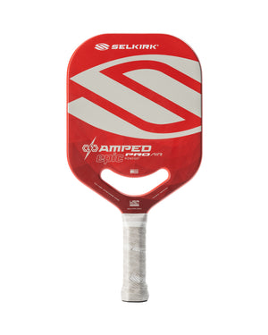 Red Selkirk pickleball paddle with white S logo, wrapped grip; visible text: SELKIRK, AMPED, epic, PRO, AIR, MIDWEIGHT, USA
