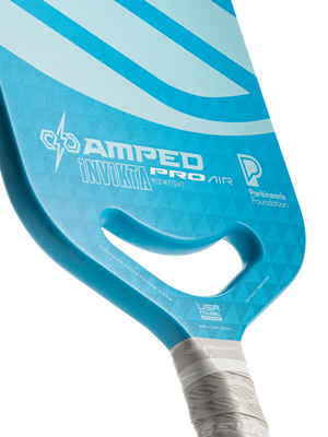Blue Selkirk paddle labeled AMPED PRO AIR INVICTA MIDWEIGHT with Parkinson's Foundation logo, USA Pickleball and selkirk.com