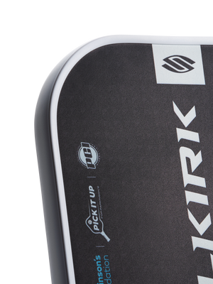 Close-up of paddle edge showing "PICK IT UP" tagline and "KIRK" vertical logo.