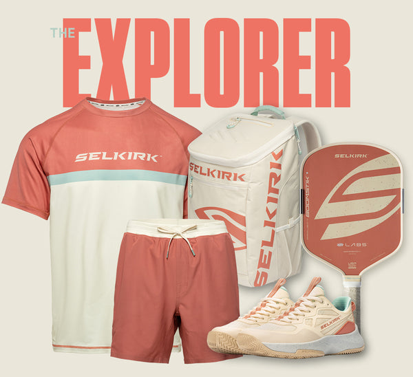 Selkirk "The Explorer" pickleball collection in a terracotta, cream, and mint palette, featuring a coral-and-cream colorblock tee with the Selkirk logo, matching coral shorts with a drawstring waist, a cream backpack with coral Selkirk branding, a terracotta Project Boomstik LABS paddle, and cream-and-coral court shoes.