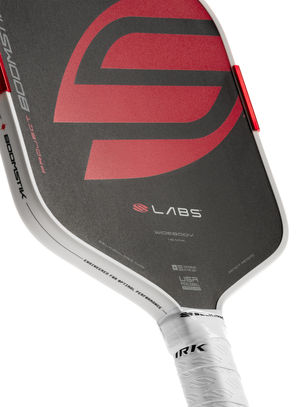 Selkirk LABS Project Boomstik pickleball paddle widebody shape in black, red, and white.