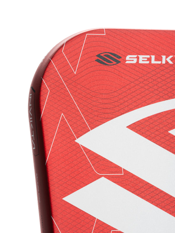 Selkirk LUXX Control Air Pickleball Paddle with InfiniGrit in the Epic paddle shape. In blue, red, and purple.