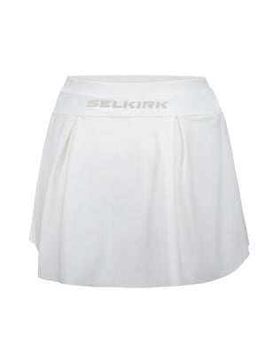 White pleated tennis skirt with SELKIRK logo centered on the waistband