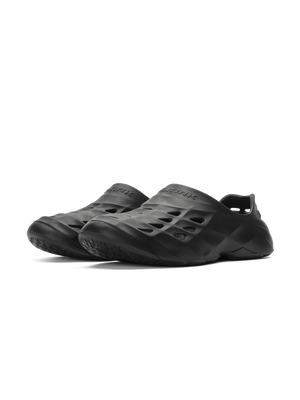 Pair of black slip-on foam clogs with sculpted vents and textured outsoles.